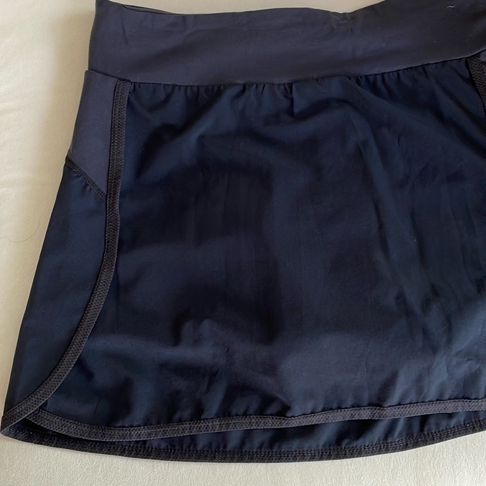 SUGOI’s RUBY PADDED SHORT CYCLING SKORT/SKIRT, women’s small